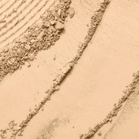 Lancôme open pan close-up showing powder texture for smooth finish benefit