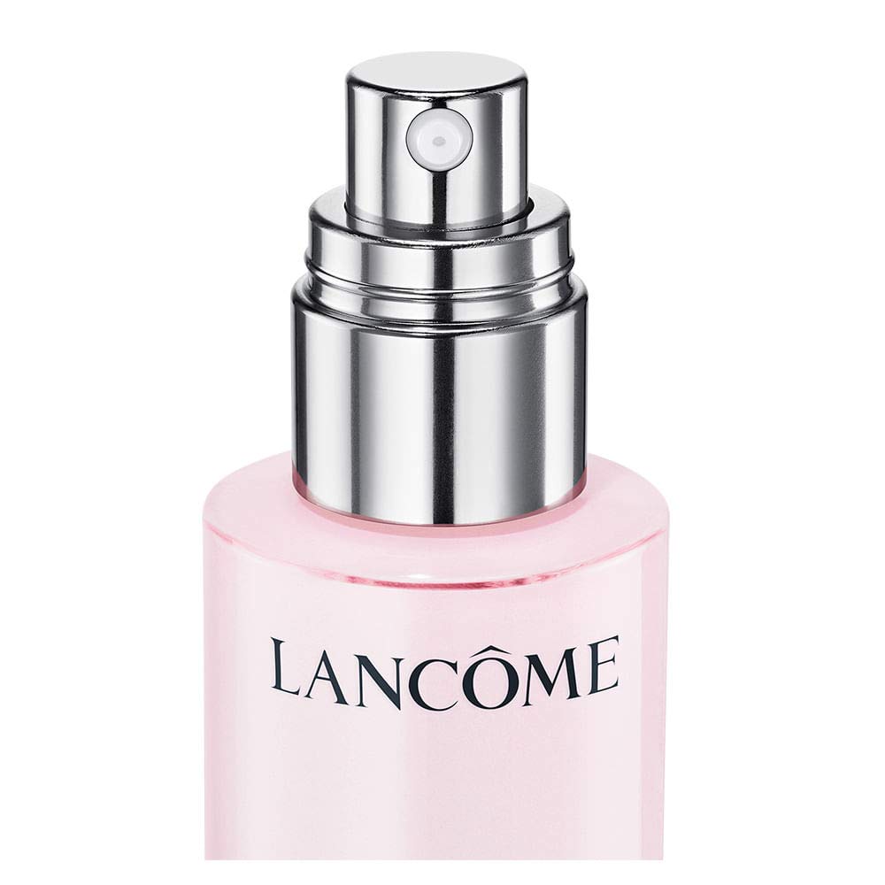 Lancôme product held in hand to show 1.7 fl oz scale and portability benefit