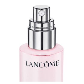 Lancôme product held in hand to show 1.7 fl oz scale and portability benefit