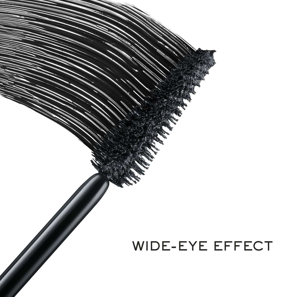 Lancôme mascara texture swiped on skin showing rich black FiberShine™ formula benefit glossy finish