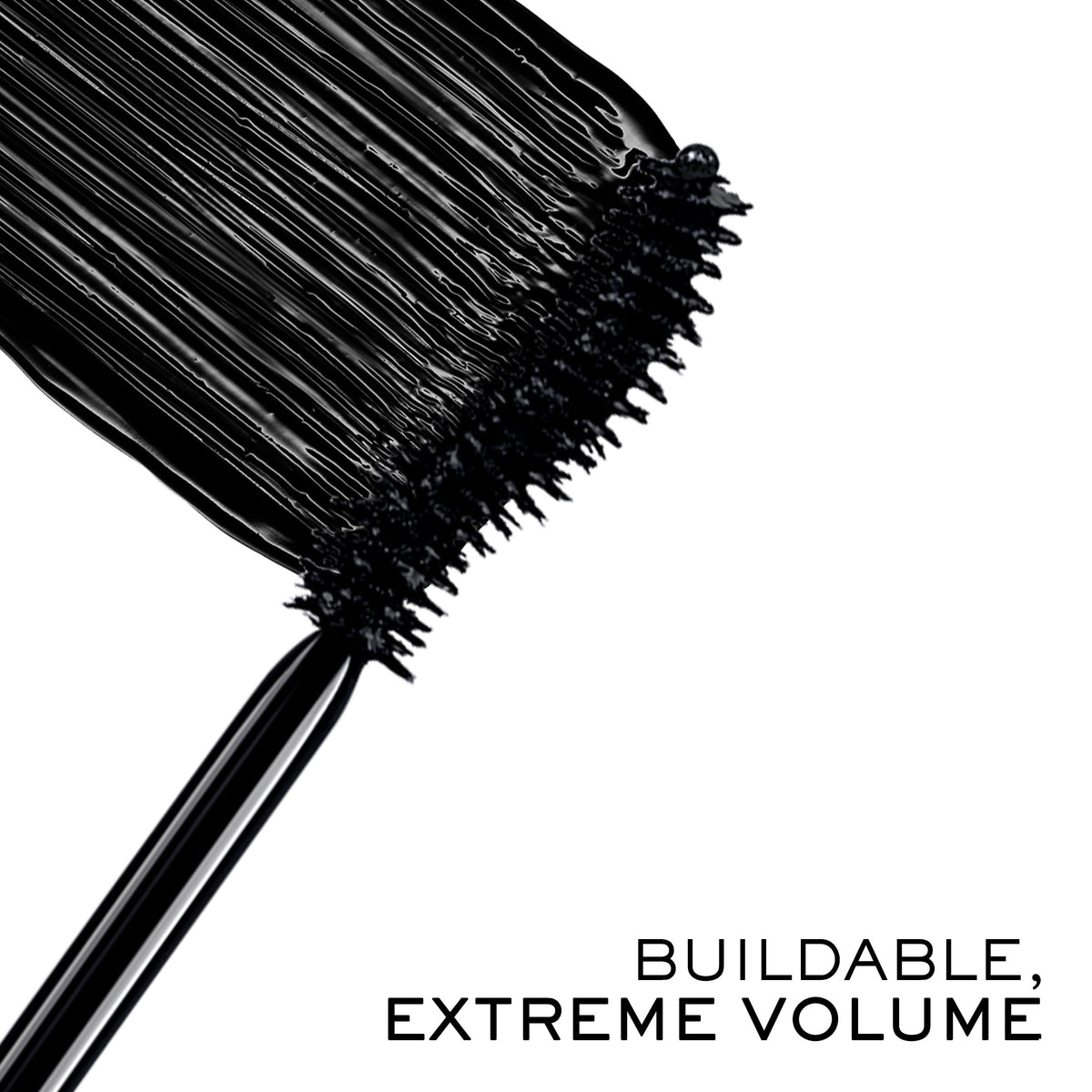 Lancôme brush close-up highlighting S-shaped wand for full coverage