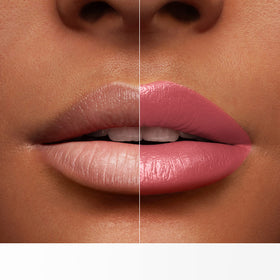 Lancôme lipstick held in hand for size comparison and travel-friendly benefit