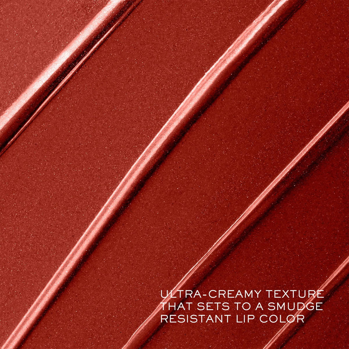 Lancôme lipstick held in hand for scale, indicates travel-friendly size and portability