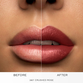 Lancôme lipstick held in hand to show scale and portable, everyday use