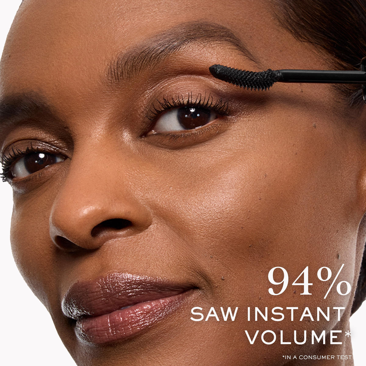Lancôme model before and after lashes showing dramatic lift and separated volume