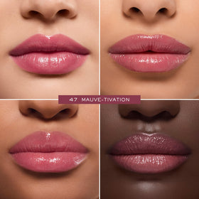 Lancôme Lip Idôle Butterglow being applied to lips demonstrating smooth coverage and instant shine