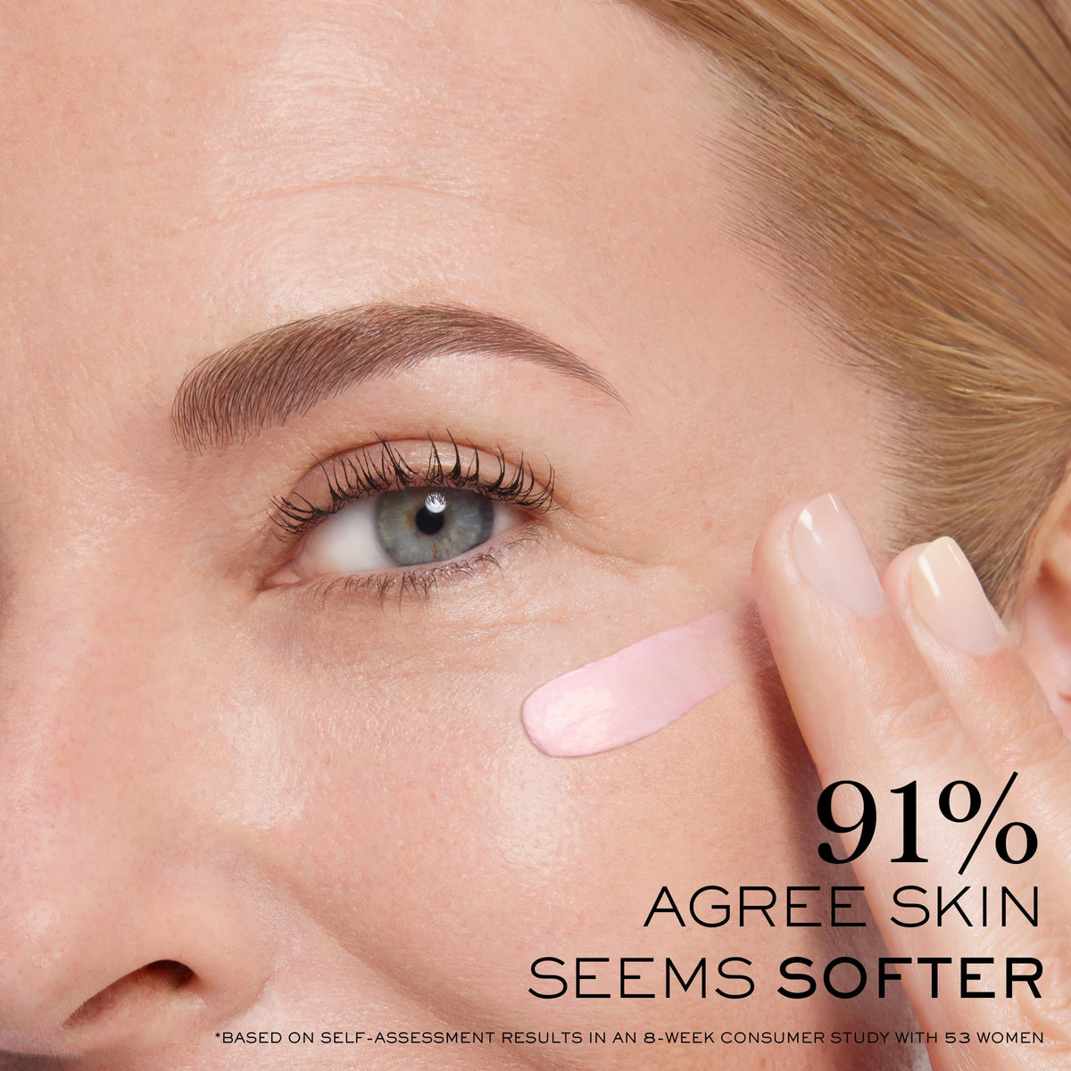 Lancôme cream being applied with fingertip to demonstrate easy absorption and de-puffing