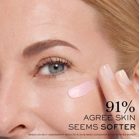 Lancôme cream being applied with fingertip to demonstrate easy absorption and de-puffing