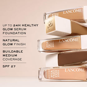 Lancôme serum texture close-up showing hydrating formula benefit: visible moisture