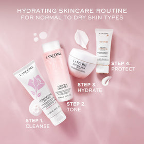 Lancôme product being applied to hand illustrating immediate smoothing and moisturizing effect