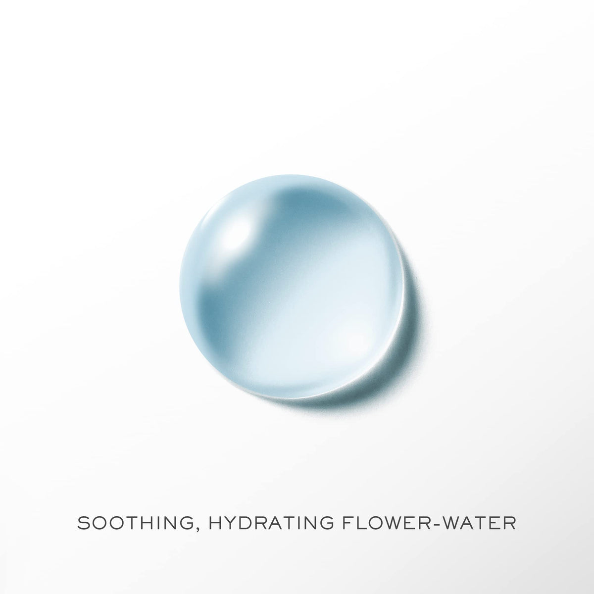 Lancôme product texture on cotton pad highlighting soothing distilled flower-water and softening effect