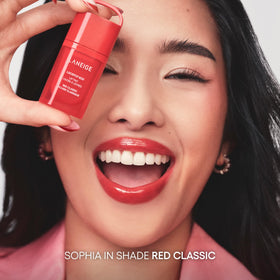 LANEIGE JuicePop Box in a handbag pocket lifestyle shot highlighting portability and style