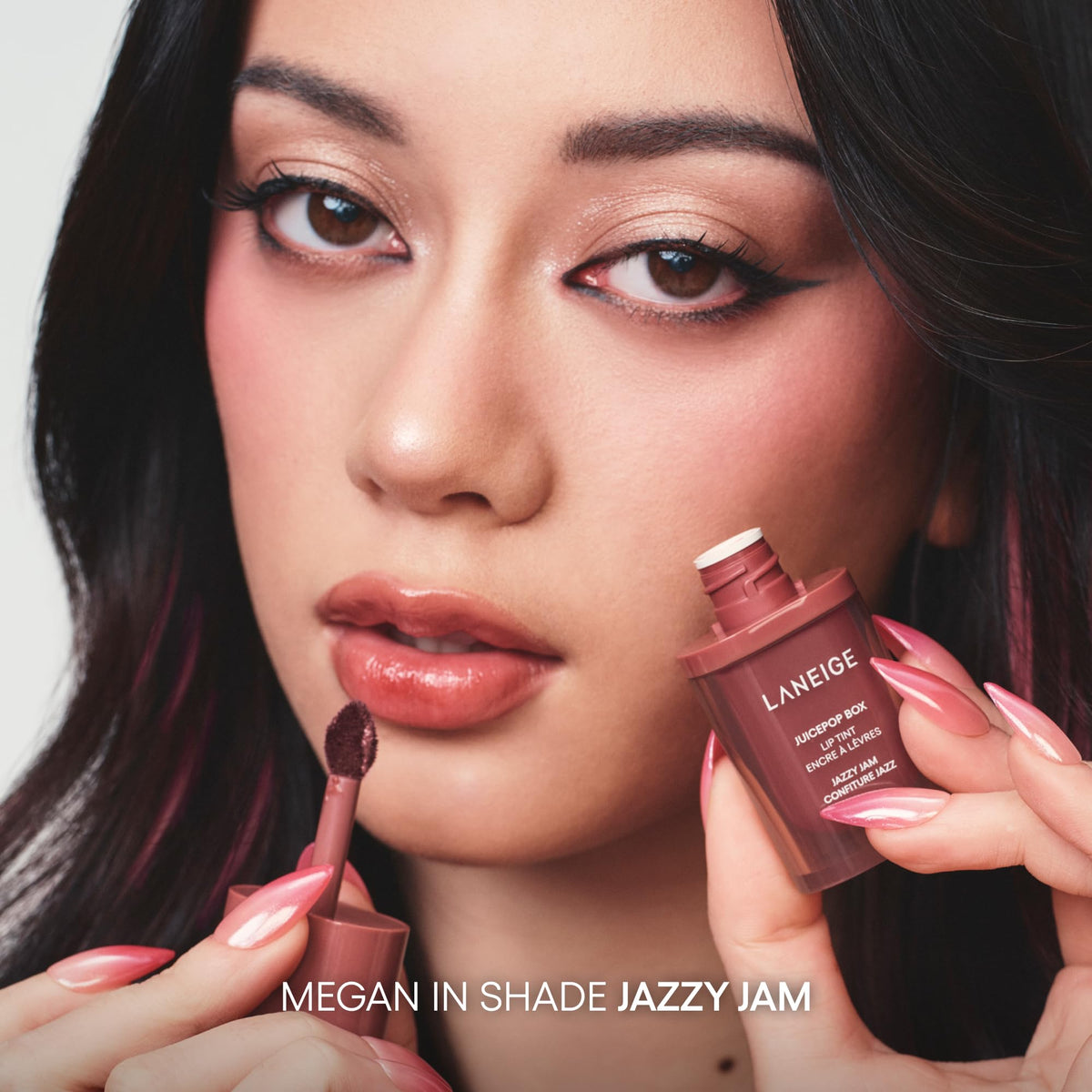LANEIGE tint clipped inside a handbag ready for touch-ups showing lifestyle portability