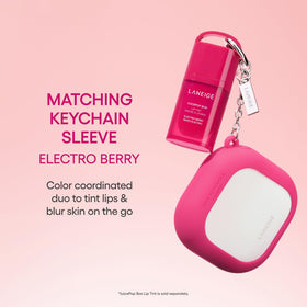 LANEIGE silicone keychain sleeve in Electro Berry clipped for stylish, handy storage