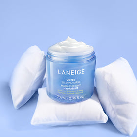 LANEIGE jar beside hand for size comparison and travel-friendly benefit
