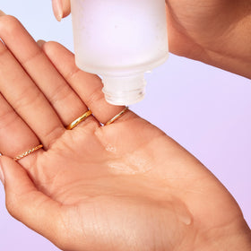 LANEIGE toner liquid poured to show texture and clarity, emphasizing hydrating absorption