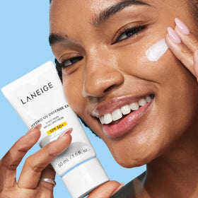 LANEIGE tube next to ruler showing compact size and travel-friendly convenience