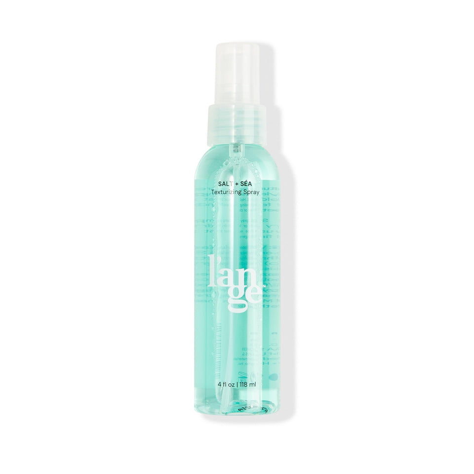 L'ANGE HAIR front bottle shot shows sleek packaging and travel-friendly 4 oz size