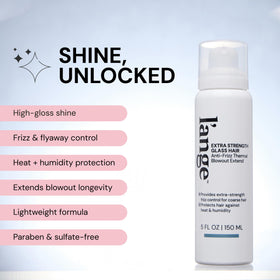 L'ANGE HAIR bottle in hand showing 5 fl oz scale for travel-friendly use