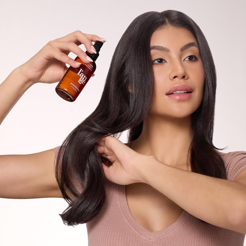 L'ANGE HAIR lifestyle shot of glossy hair after use, shows improved shine and smoothness