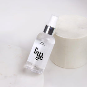 L'ANGE HAIR before and after hair photo showing smoother, shinier results