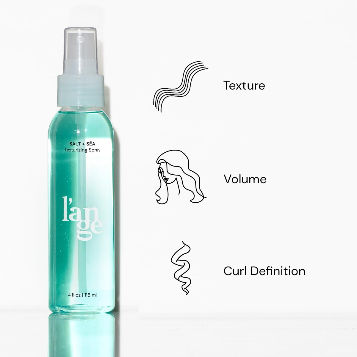 L'ANGE HAIR mist spraying from nozzle into hand showing easy, even application