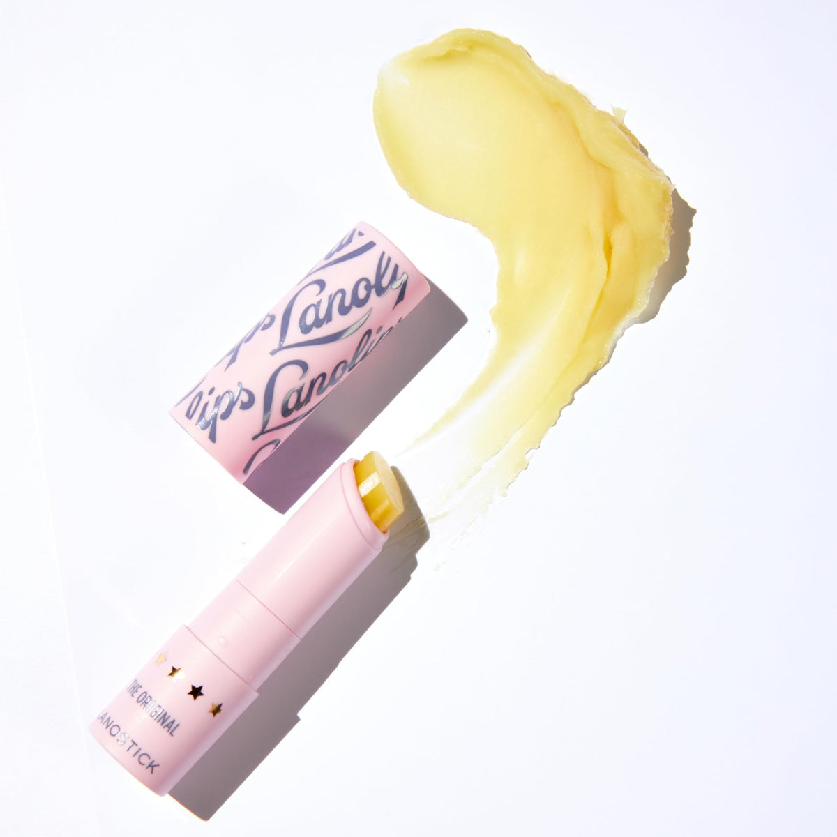 Lanolips Lanostick with cap removed demonstrating smooth, precise application benefit