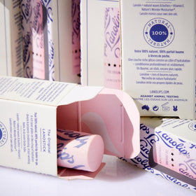 Lanolips Lanostick tucked in a pocket showing portability and on-the-go protection