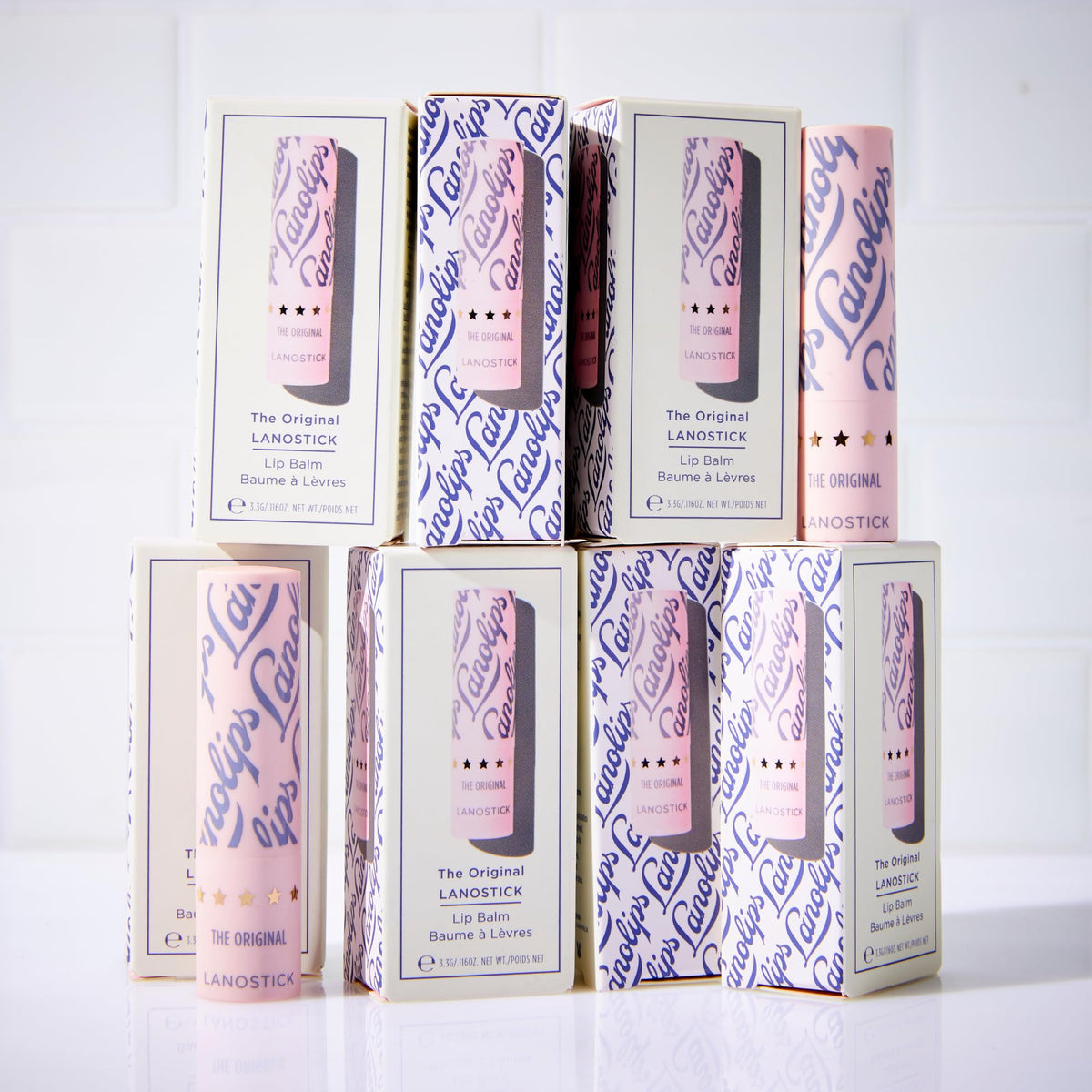 Lanolips Lanostick ingredients label highlighting lanolin, jojoba, castor and shea benefits
