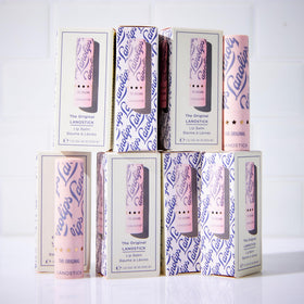 Lanolips Lanostick ingredients label highlighting lanolin, jojoba, castor and shea benefits