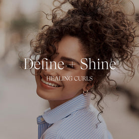 Lifestyle image of a model with defined curls styled using L’ANZA Butter Whip for soft shine