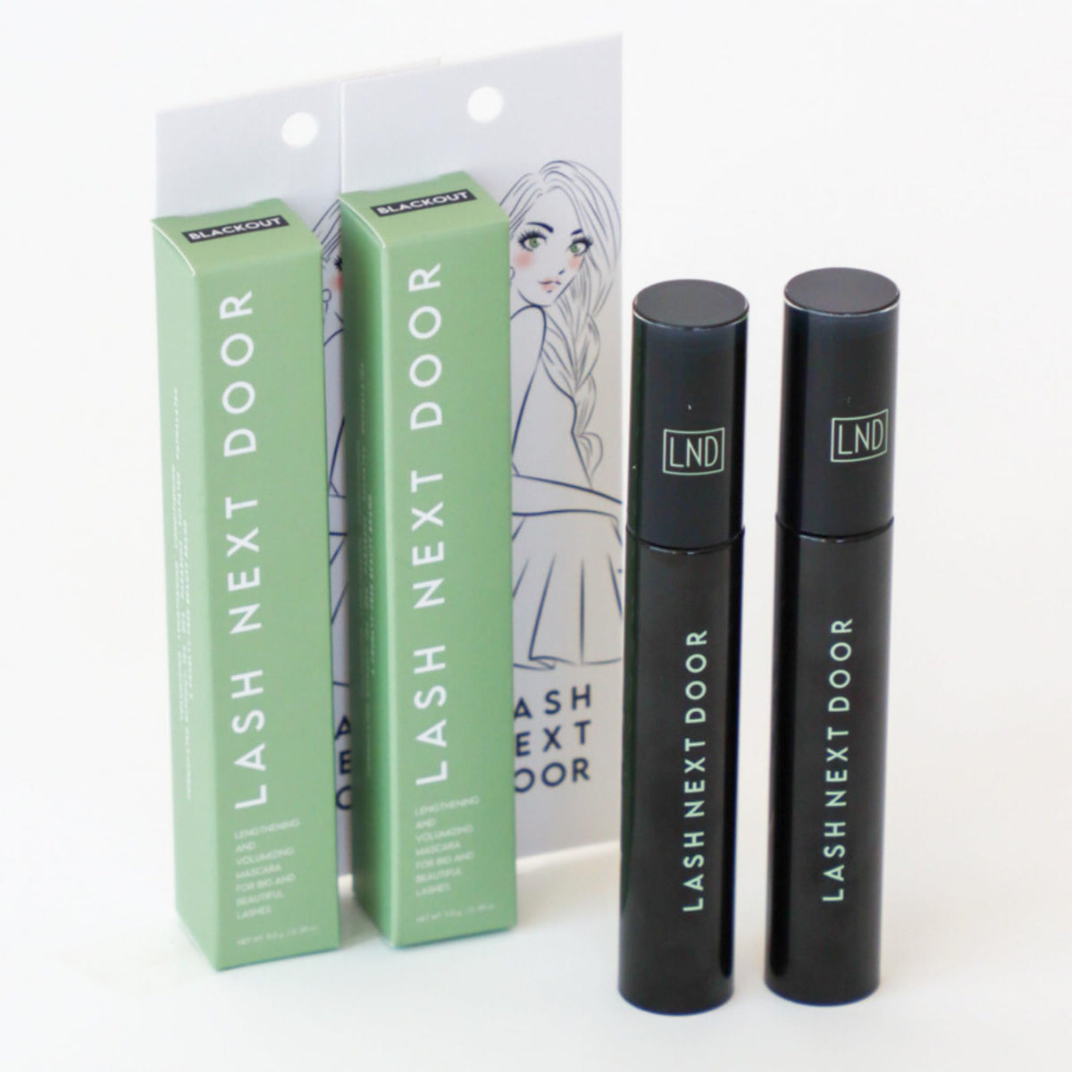 Lash Next Door tubes on bathroom vanity showing everyday routine compatibility benefit