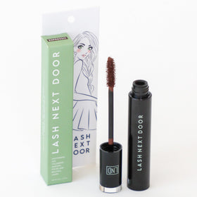 Lash Next Door on a bathroom vanity lifestyle shot suggesting effortless daily use