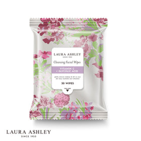 Laura Ashley hand pulling a wipe from tub demonstrating easy one-handed use