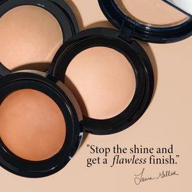 LAURA GELLER brush applying powder for a seamless, long-lasting setting benefit