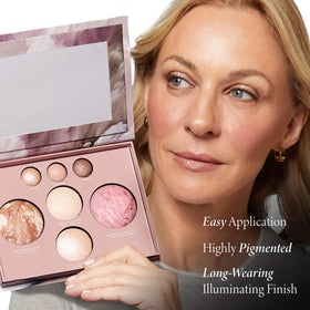 LAURA GELLER NEW YORK brush applying highlighter to cheekbones for natural radiance
