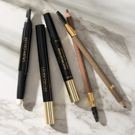 LAURA GELLER NEW YORK placed in a makeup bag illustrating travel-friendly use