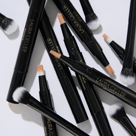 LAURA GELLER NEW YORK model applying primer showing easy use and improved eyeshadow hold