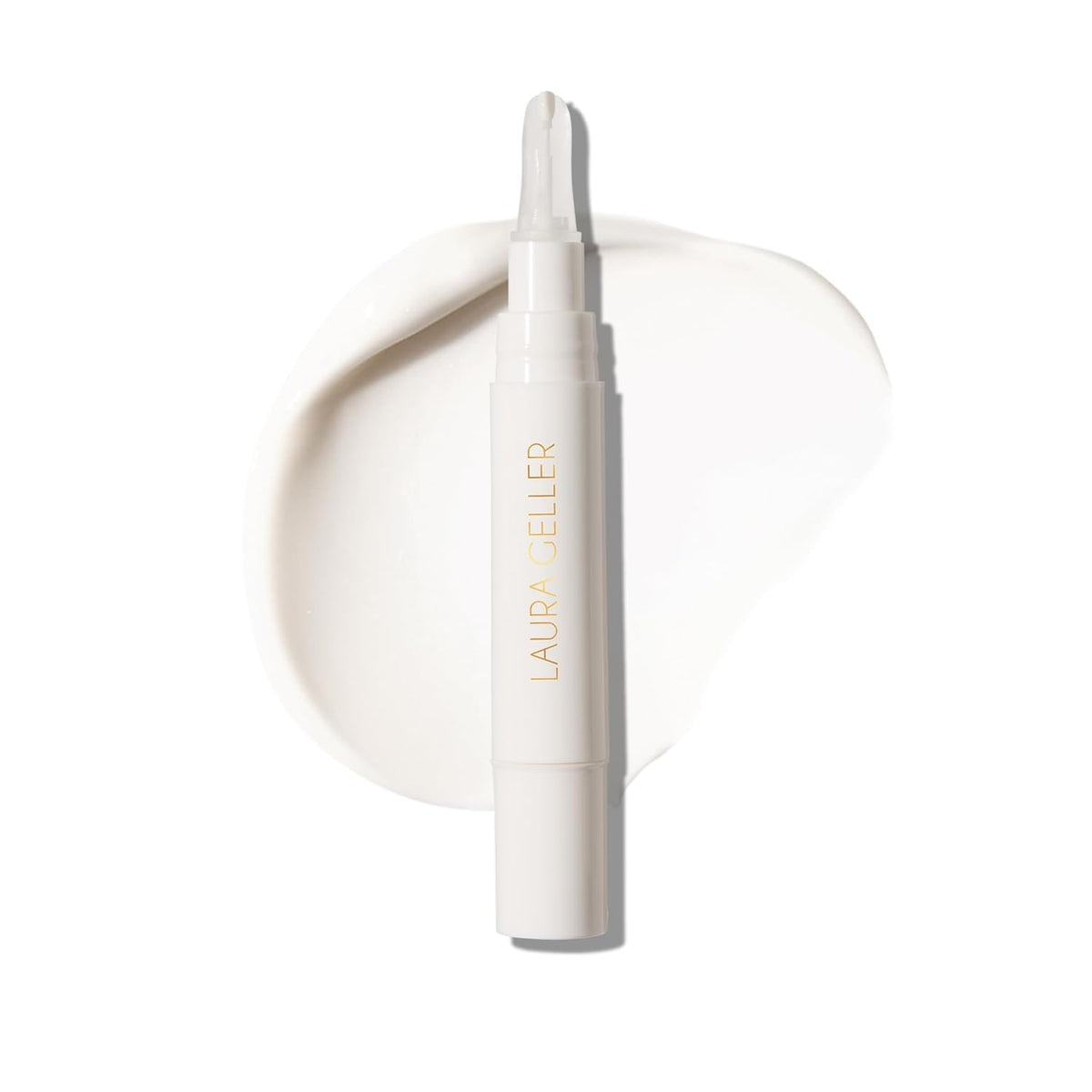 LAURA GELLER front packaging of Spackle under-eye primer showing product and branding benefit: visible brightening