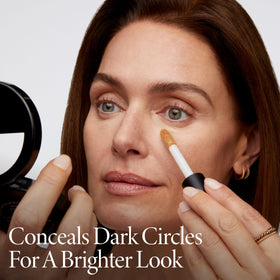 LAURA GELLER applying concealer under eye for lifted, brighter look