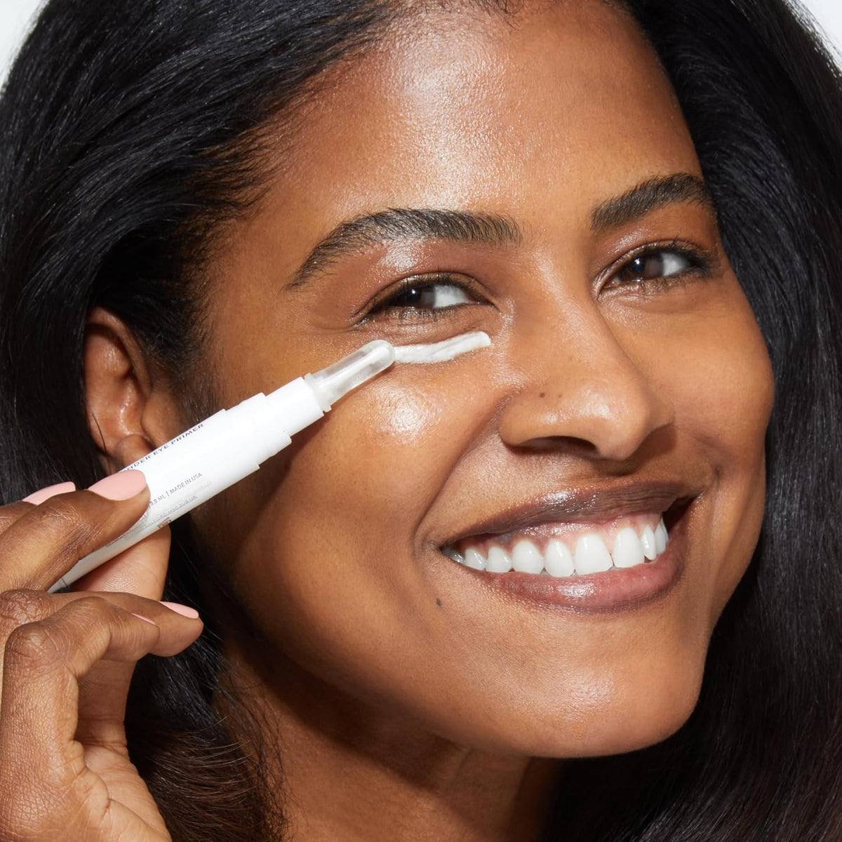 LAURA GELLER ingredient label detail highlighting botanical extracts and brightening micronized pearls