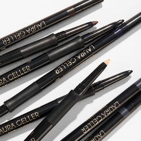 LAURA GELLER NEW YORK pencil held in hand to show portable size advantage