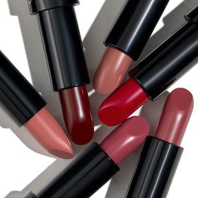 LAURA GELLER NEW YORK lipstick inside makeup bag showing everyday use