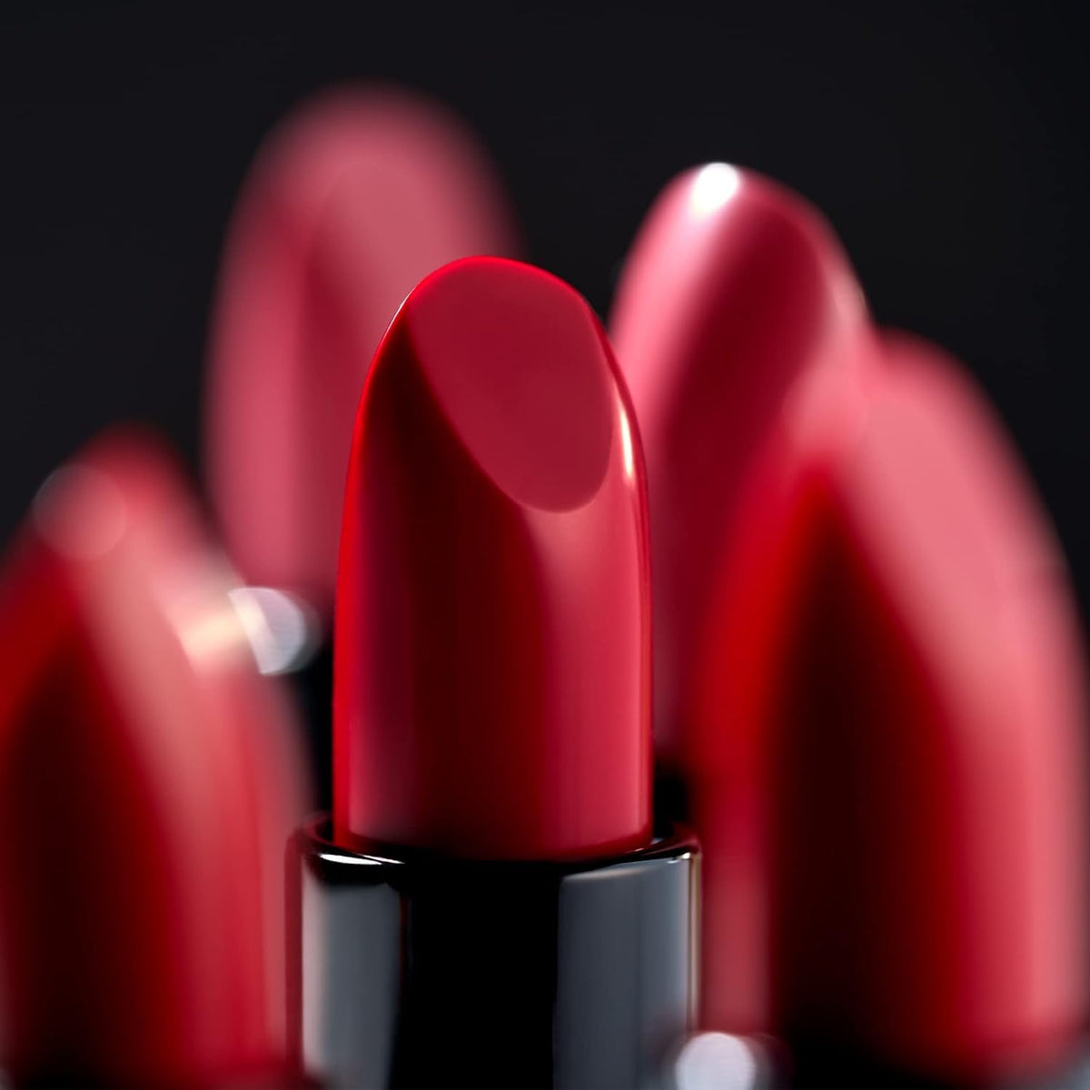 LAURA GELLER NEW YORK lipstick in fashion handbag showing portable size and on-the-go convenience