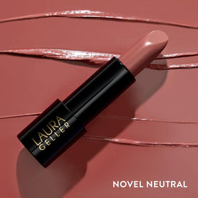 LAURA GELLER NEW YORK lipstick worn by model showing flattering smile