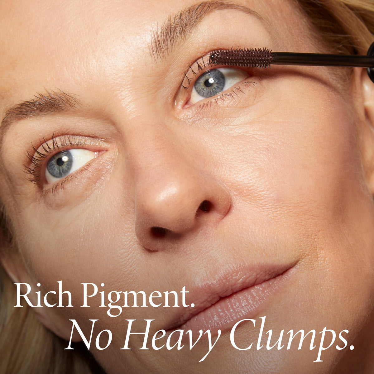 LAURA GELLER NEW YORK lifestyle model wearing brown mascara for soft definition and natural look