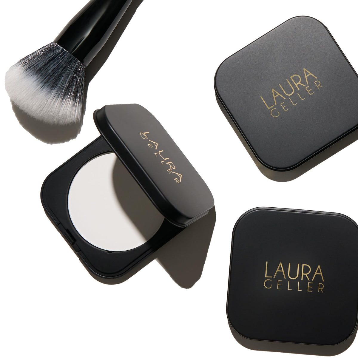LAURA GELLER NEW YORK compact beside a coin illustrating compact size and portability