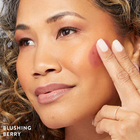 LAURA GELLER NEW YORK applicator held in hand showing size and travel-friendly scale