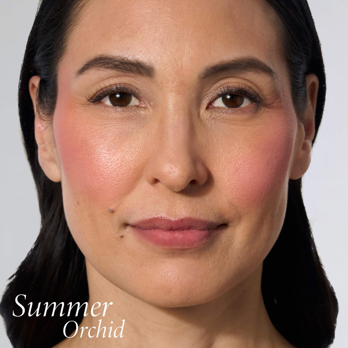 LAURA GELLER NEW YORK arm swatch of Summer Orchid demonstrating buildable color