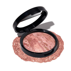 LAURA GELLER NEW YORK compact top view showing marbleized finish and easy grab